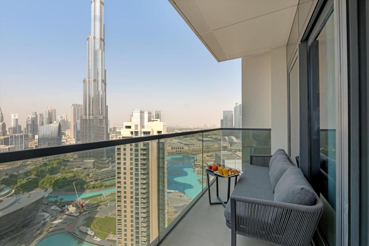 Direct Burj & Fountain Views - Designer 4BR Haven!