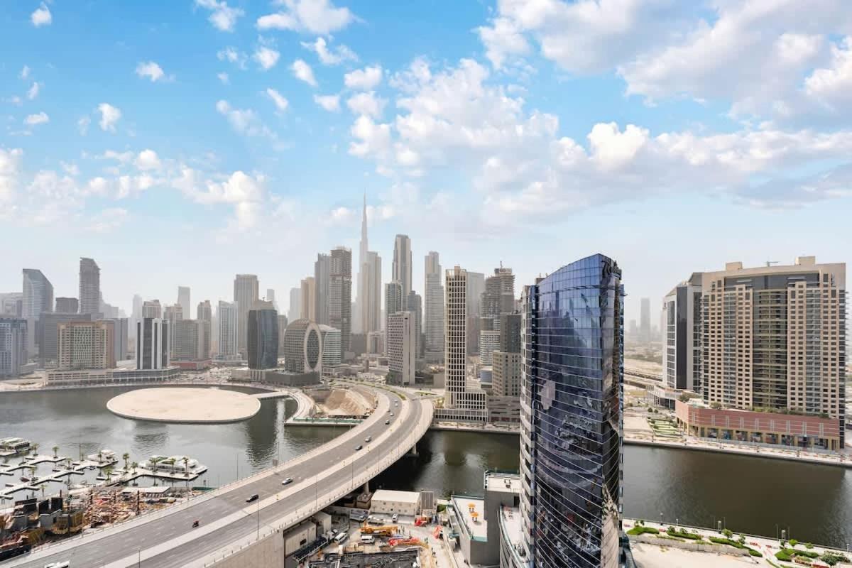 FAM Living - 2BR Apartment with Burj & Canal Views at The Bay - 3