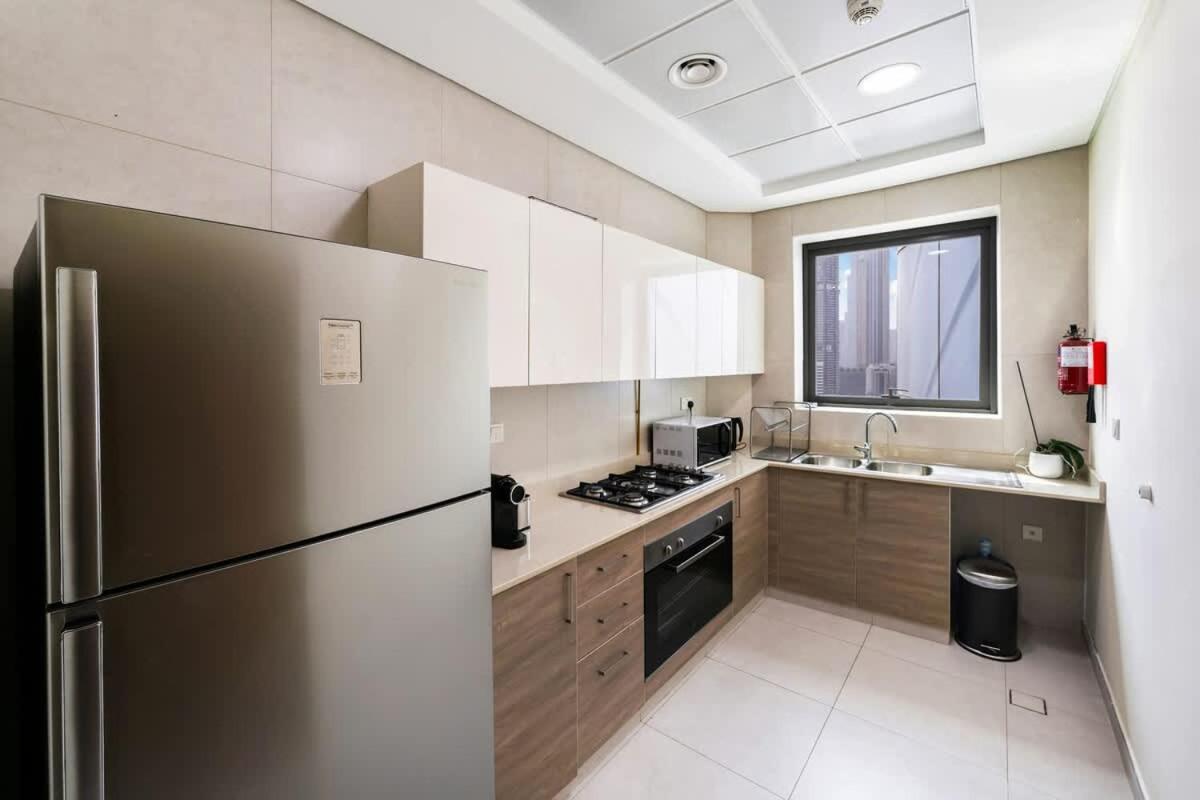 FAM Living - 2BR Apartment with Burj & Canal Views at The Bay - 5