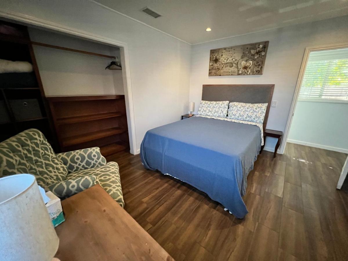 An Amazing comfortable home front middle unit 1q bed and other room with sofa - 2