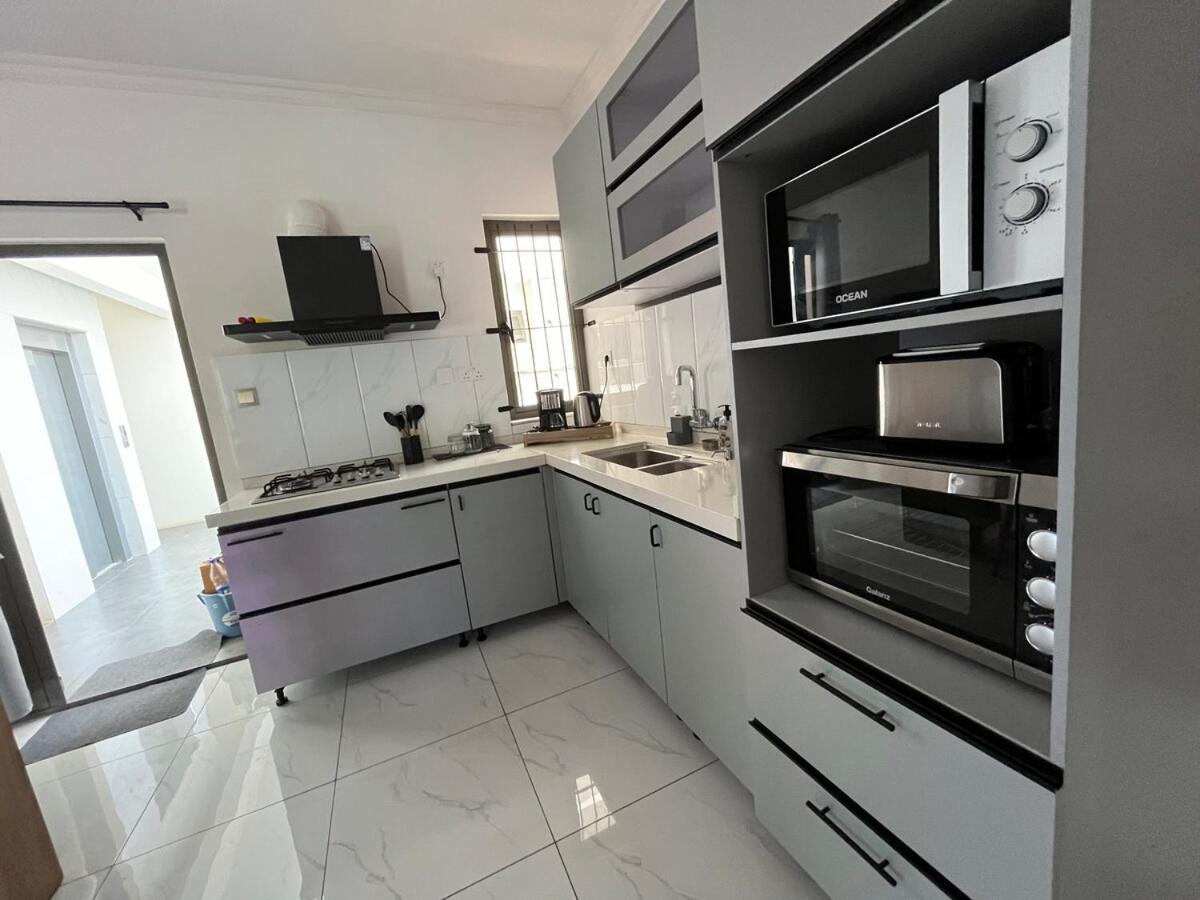 Nayuha Apt A1 - 3 bed rooms - Reach for the beach, across the road - 5