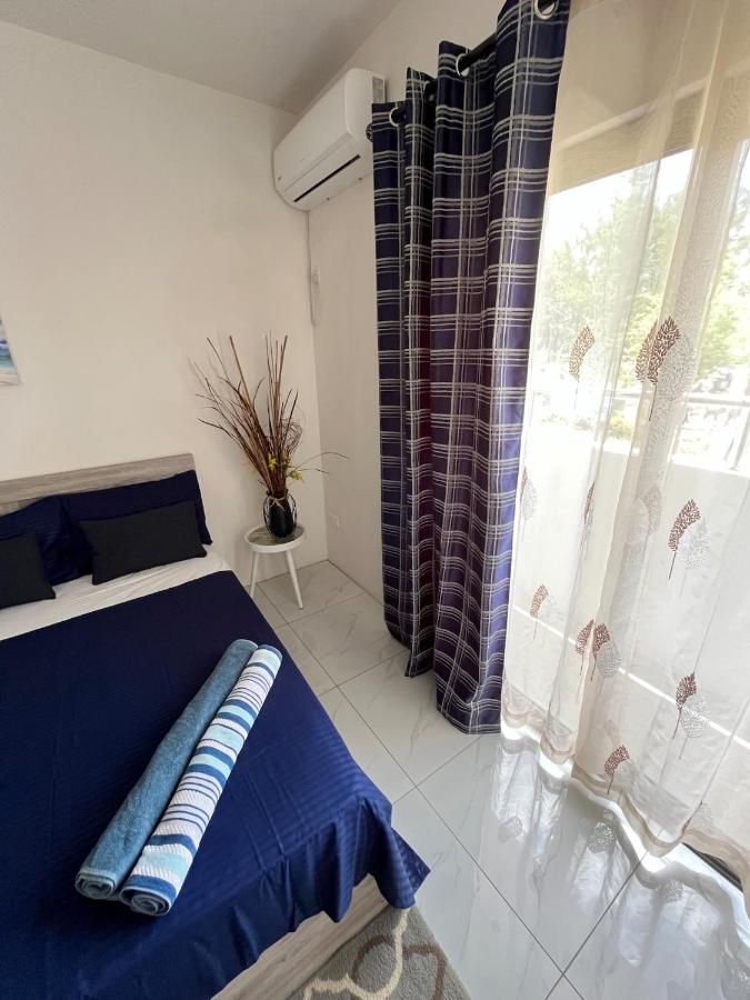 Nayuha Apt A1 - 3 bed rooms - Reach for the beach, across the road - 2