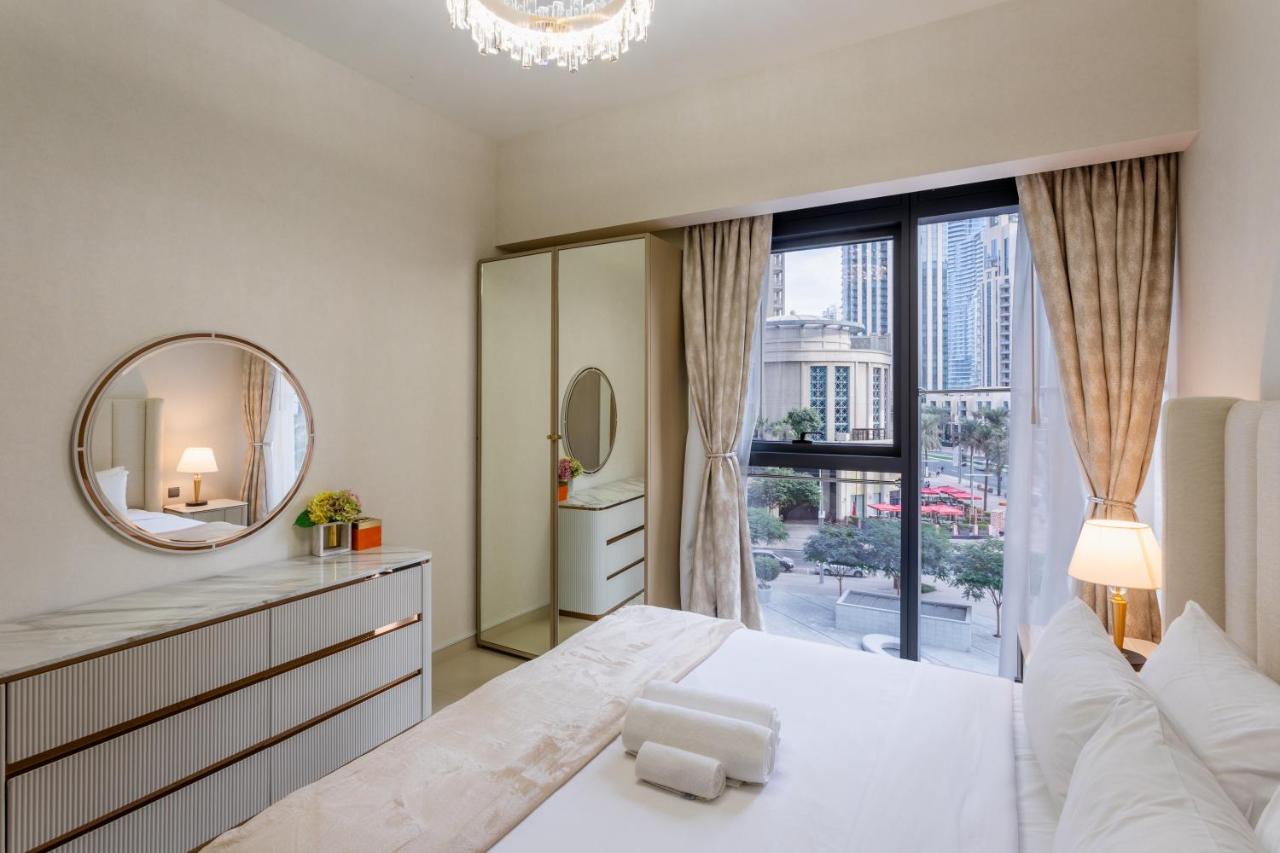 Vacationer Holiday Homes I Exquisite 1 Bed l Pool Access which has Burj Khalifa View l Downtown - 2