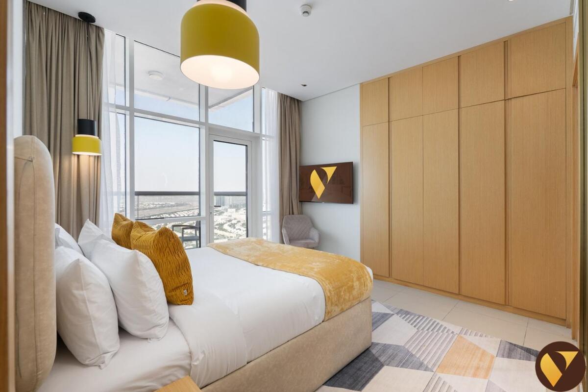 Vogue Vacation Homes, JVT Novotel near Springs Souk Mall, One Bedroom apartment with Balcony and Vibrant Community View, Access to all Amenities - 4