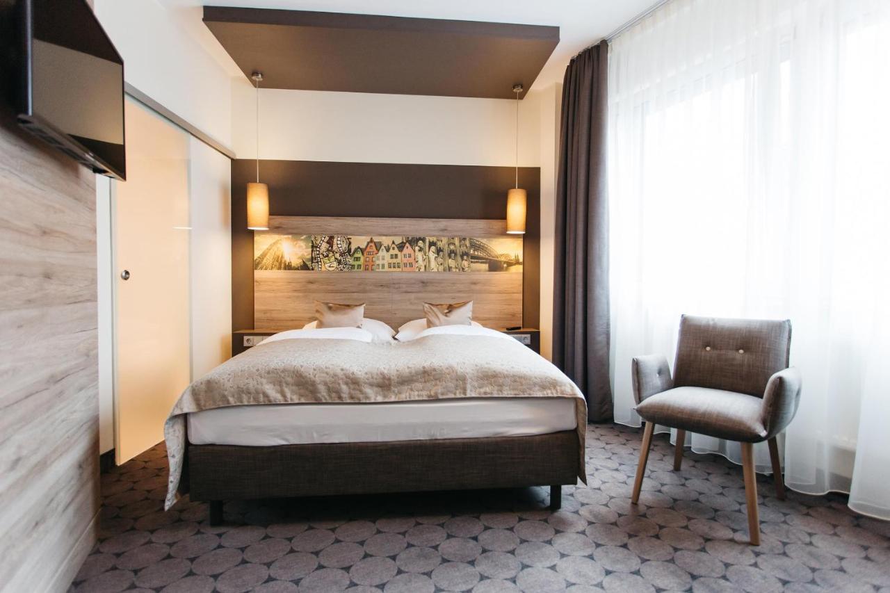 Hotel Sion in Koln - Beleef het hart van Keulen met authentieke Rijnlandse charme.