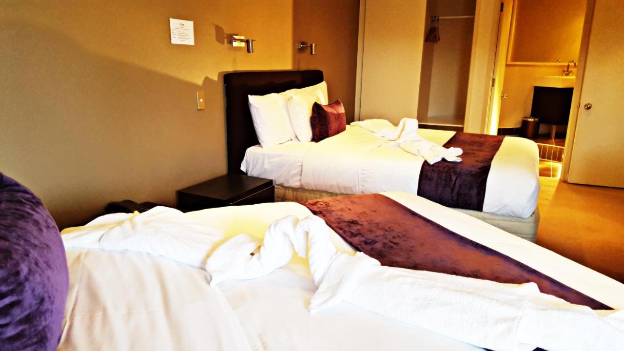 Auckland Airport Kiwi Hotel - Laterooms