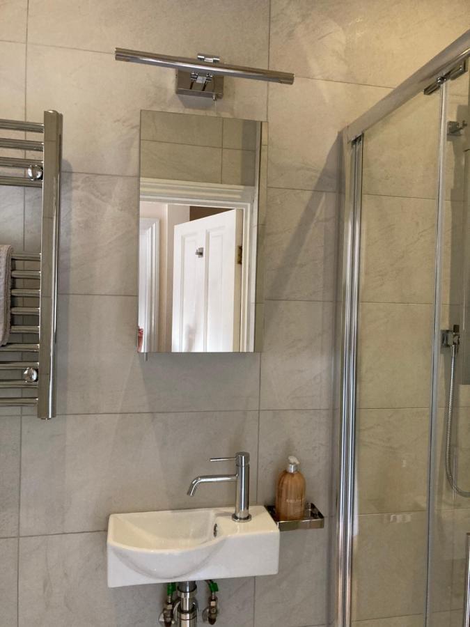 Luxurious tranquil large bedroom and bathroom suite with rooftop views in interior designed Georgian Townhouse - 3