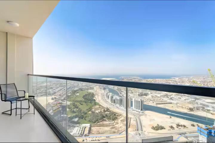 Vogue Vacation Homes, Business Bay Aykon City Tower Close to Downtown Burj Khalifa and Dubai Mall, Two Bedroom Apartment with Large Balcony Sea view, Access to all Amenities - 3