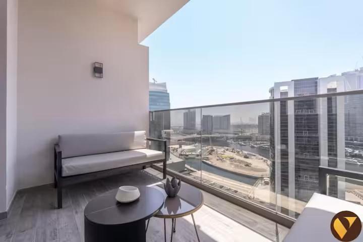 Vogue Vacation Homes, Downtown Mag 318 near Burj Khalifa and Dubai Mall, Studio Apartment with Balcony, Canal and City Skyline View, Access to all Amenities - 3