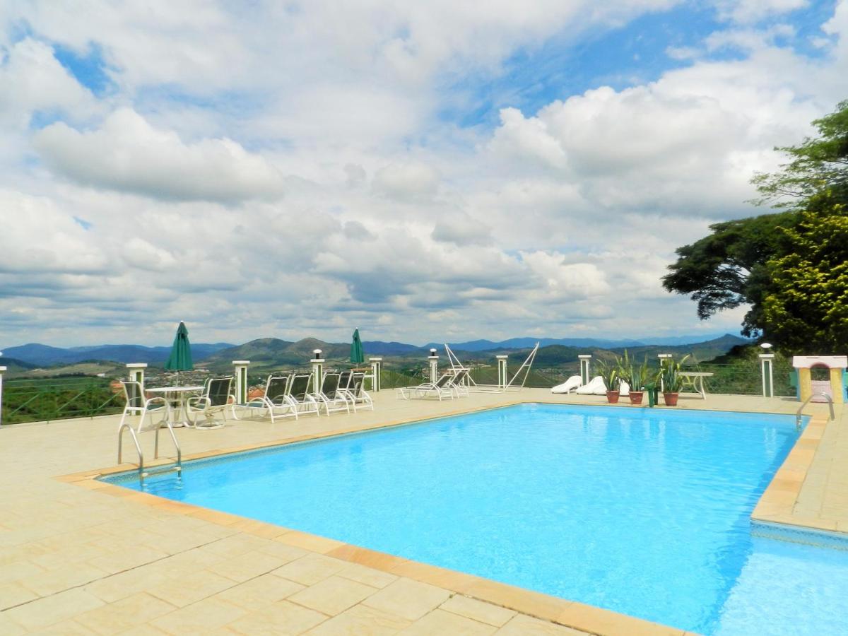Heated swimming pool: Pousada Lambari Montanha Hotel