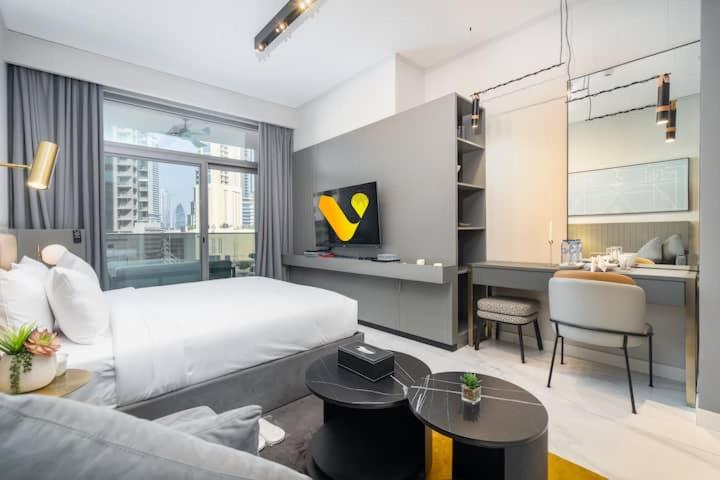 Vogue Vacation Homes, Downtown Mag 318 near Burj Khalifa and Dubai Mall, Studio Apartment with Balcony and City View, Access to all Amenities - 2