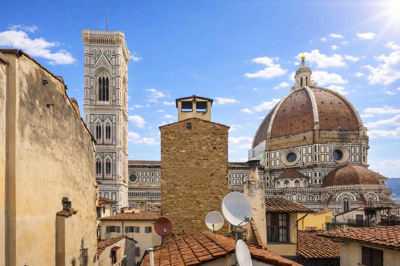 In front of the Duomo