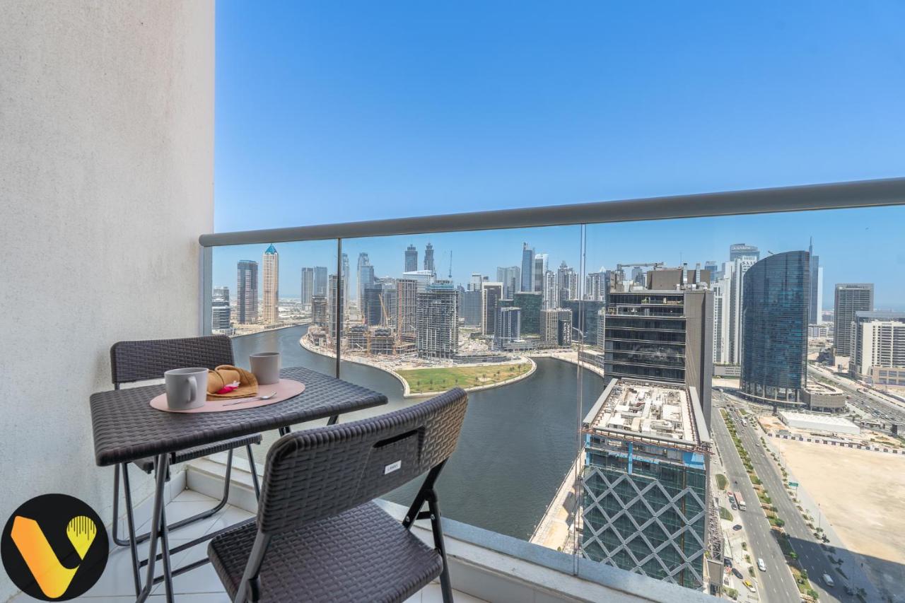 Vogue Vacation Homes, Business Bay Damac Maison Prive near Burj Khalifa and Dubai Mall, Studio Apartment with Balcony, Canal and City View, Access to all amenities - 3