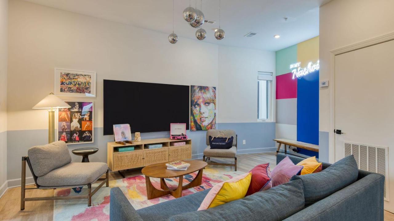 Sleeps 44 4 themed lofts w skyline balconies neon backdrops glam kitchens—perfect for Nashville group stays The Swift Retreat by AvantStay - 5