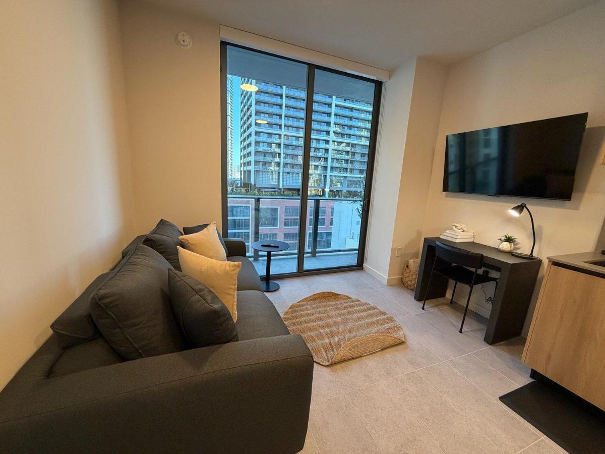 Sleek Downtown Condo w Den at 501 First - Pool Gym & Urban Views