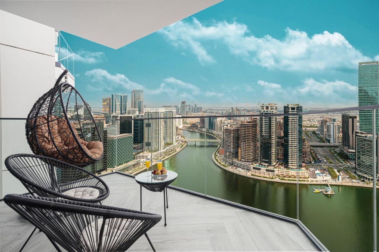 Peninsula Three Burj Khalifa & Canal Views