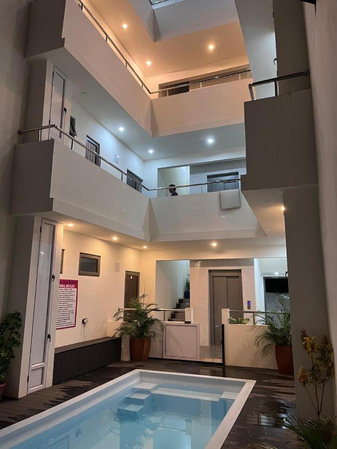 Nayuha Apt A1 - 3 bed rooms - Reach for the beach, across the road - 4