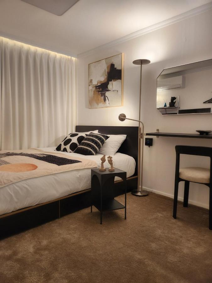 Newly opened 7minute walk from Myeongdong 3 minutes from Namsan Tower Private kitchen living room 2 rooms 2 queensize beds For 4 people