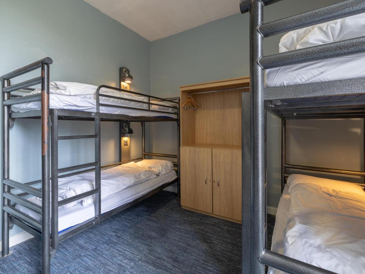 Bunk Bed in Male Dormitory Room with Shared Bathroom