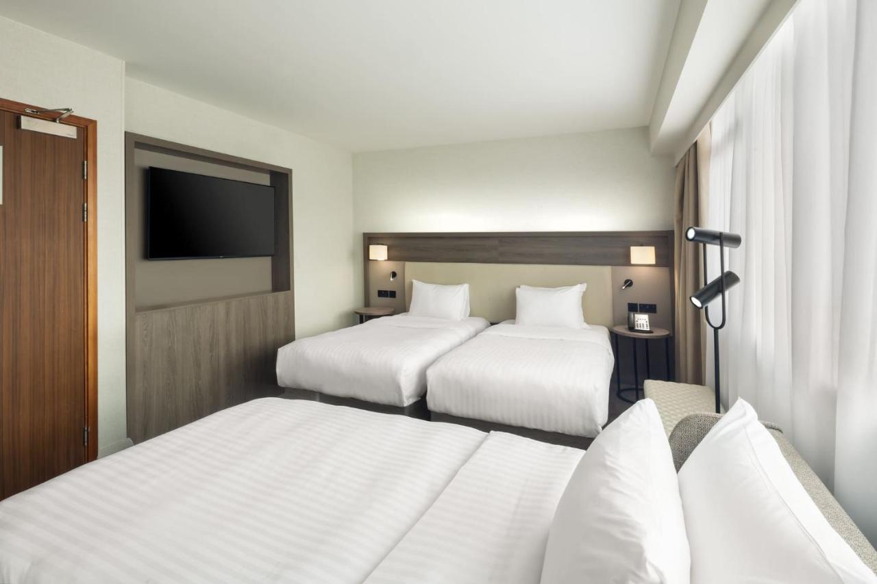 Twin Room with Two Single Beds and Sofa Bed
