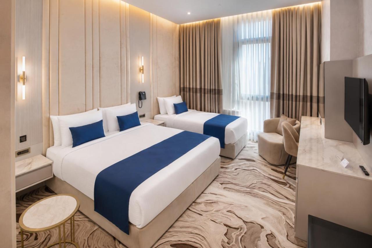 Trendy Room with 1 King + 1 Single Bed