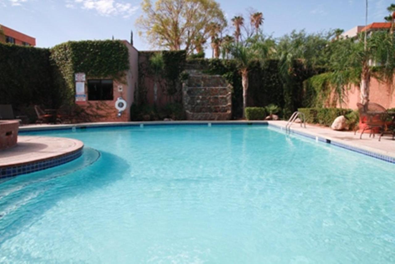 Heated swimming pool: Ramada by Wyndham Viscount Suites Tucson East