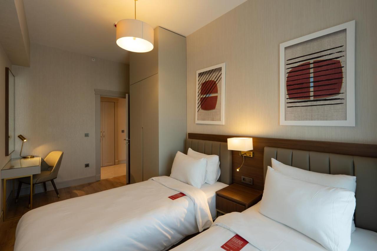 Two-Bedroom Family King Apartment with Two Single Beds