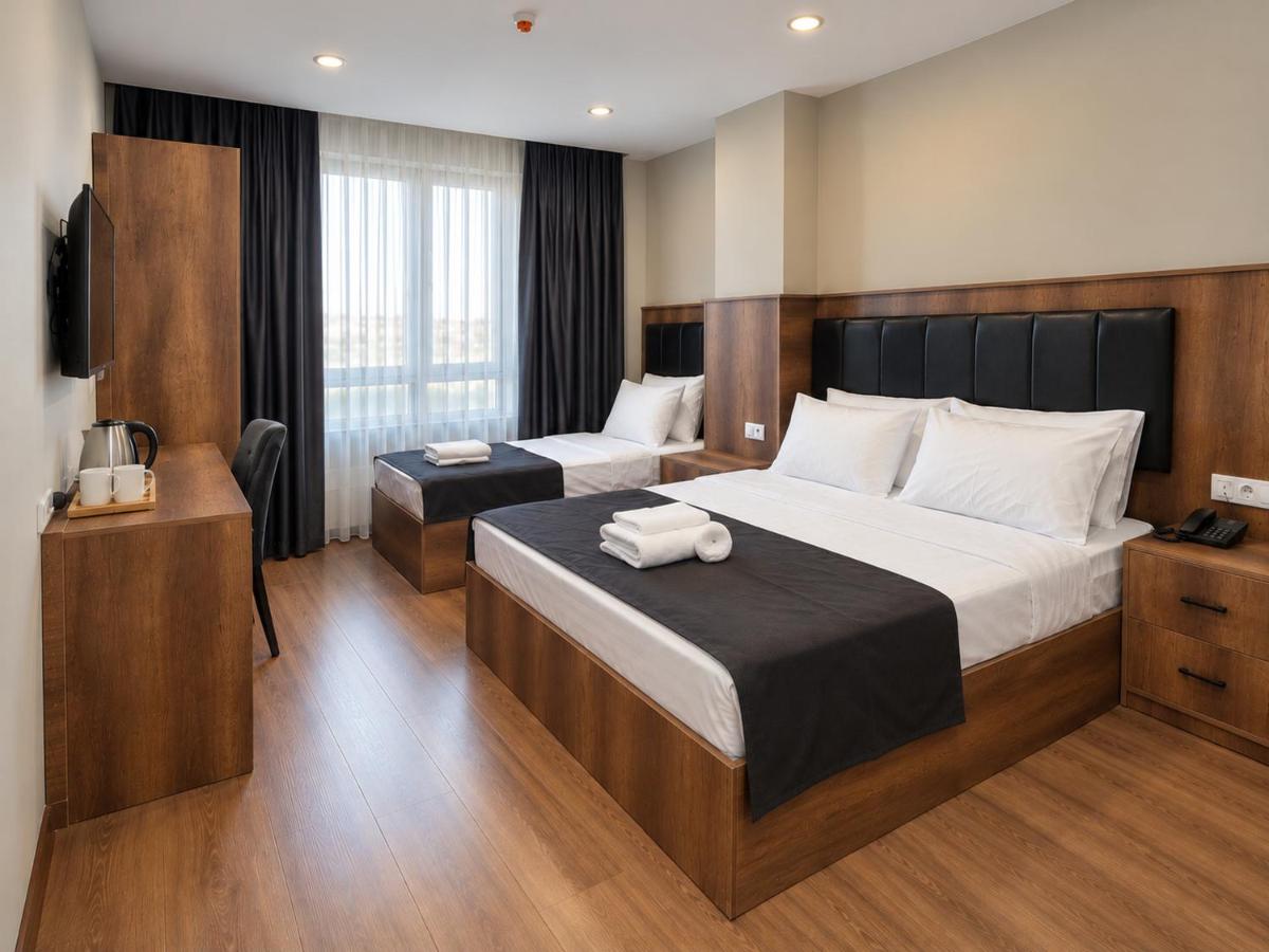 Deluxe Üç Kişilik Oda