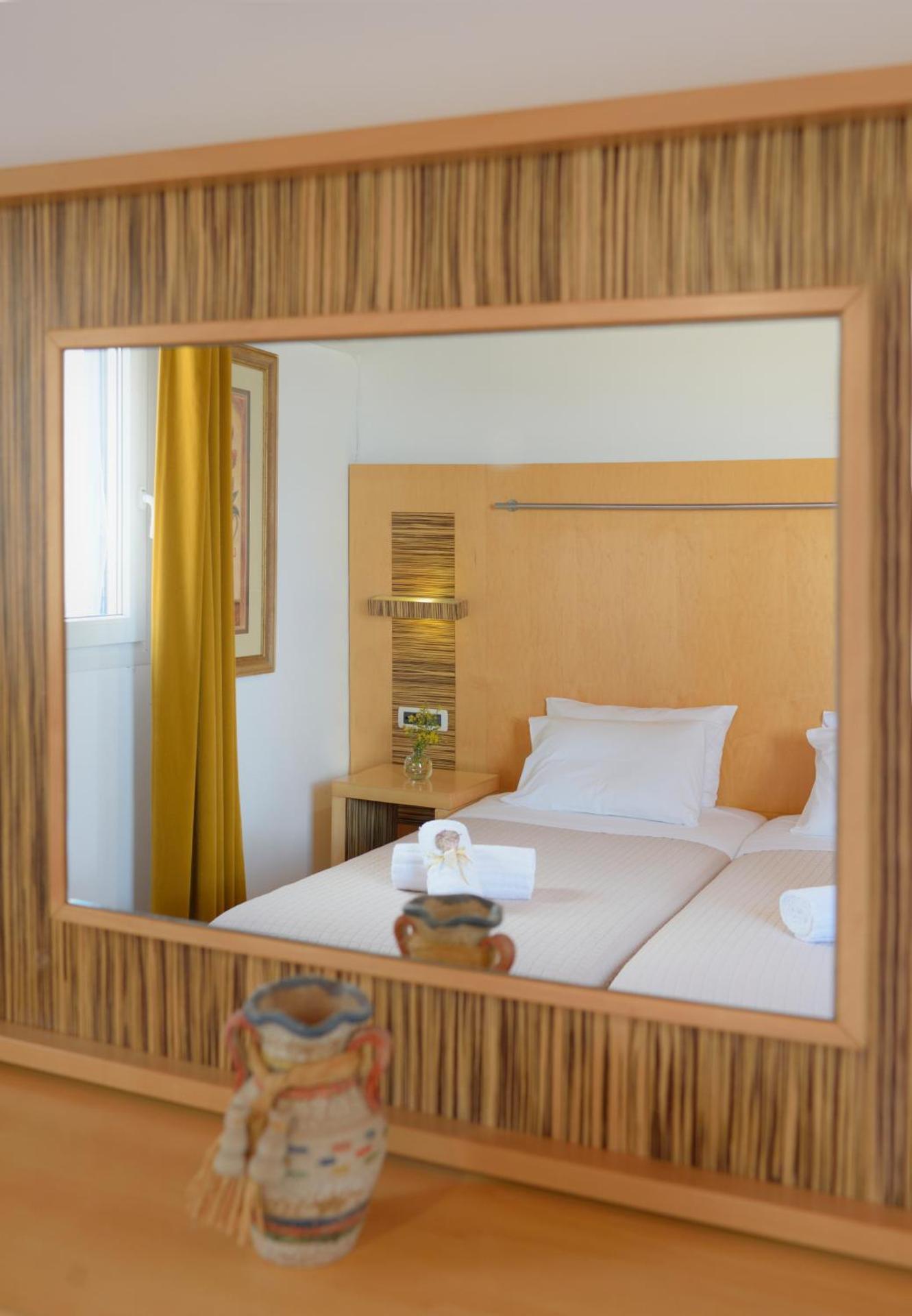 Adonis Rooms - Photo 31