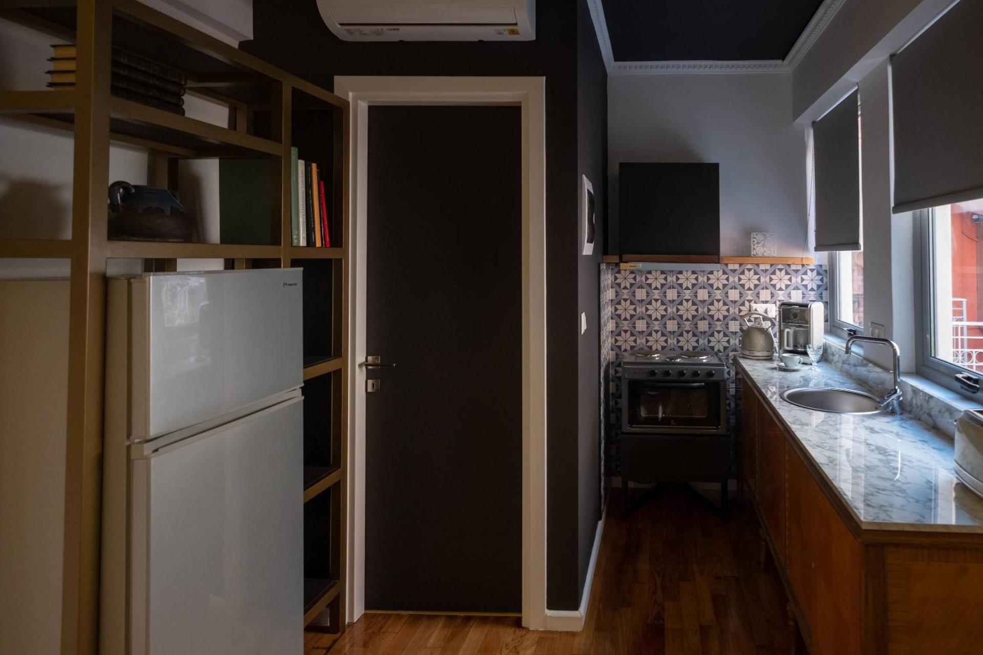 ATHENIAN YARD SUITES - Photo 13