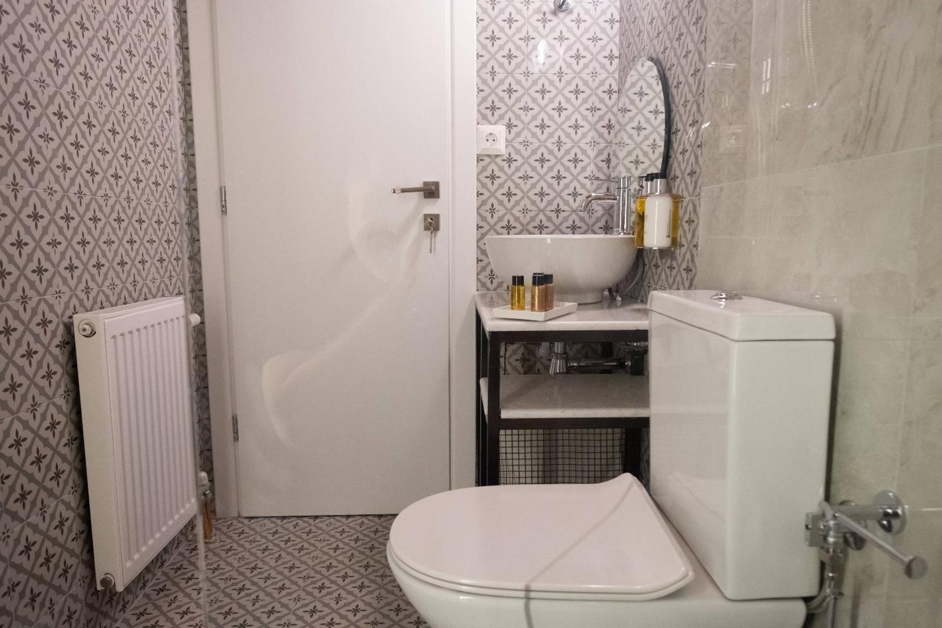 ATHENIAN YARD SUITES - Photo 66