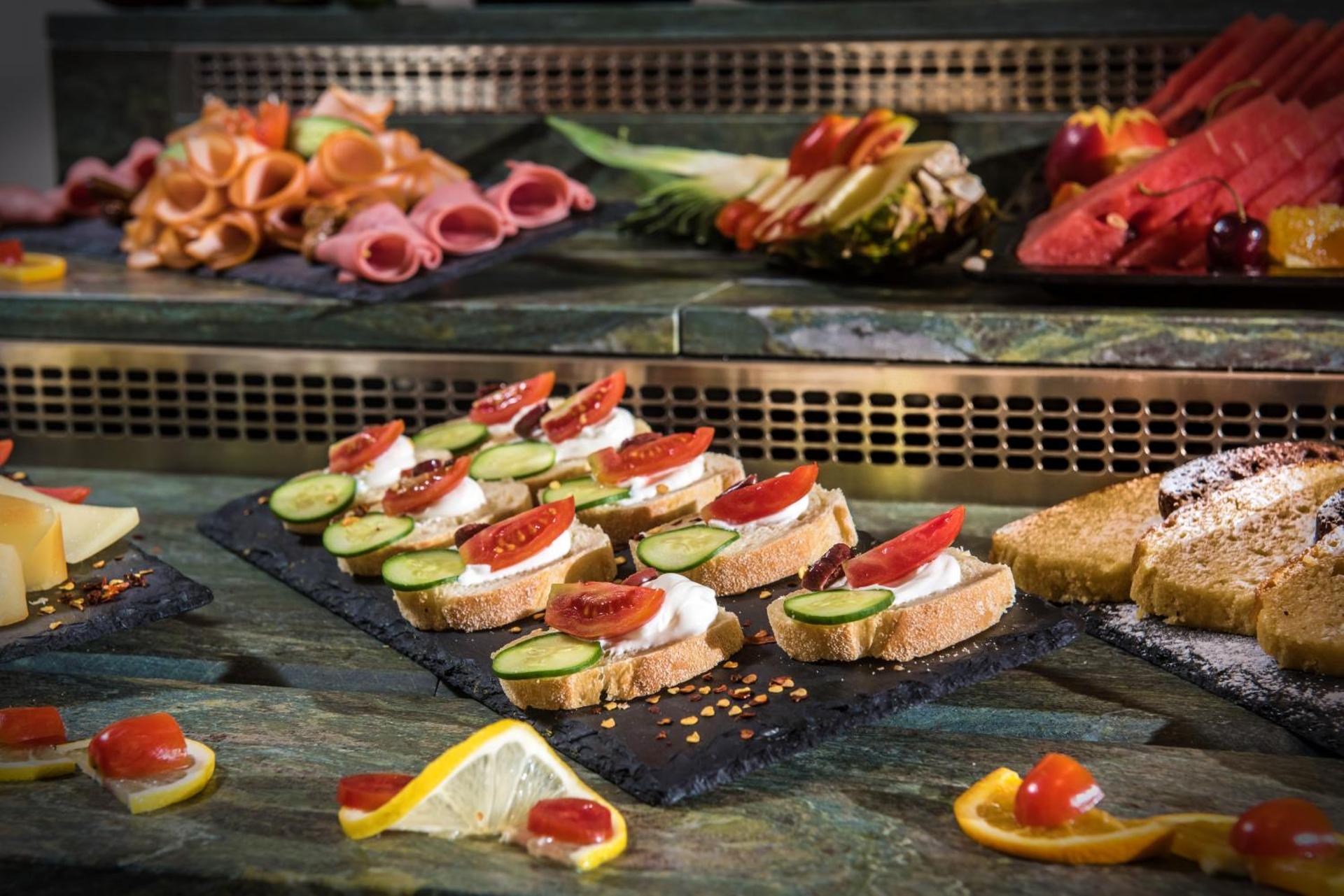 Petousis Hotel & Suites - Photo 38