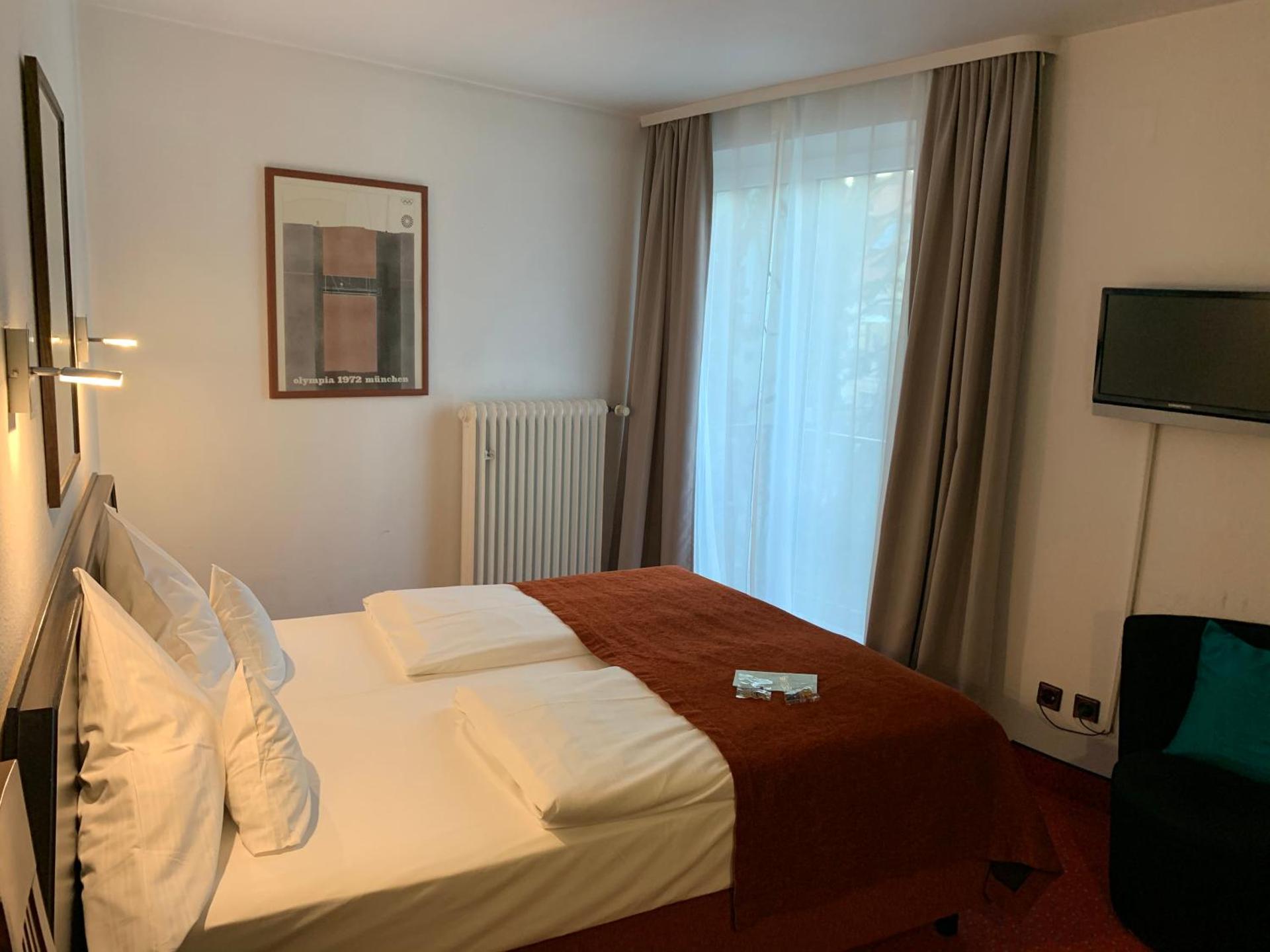 Hotel Nymphenburg City - München - Photo 53