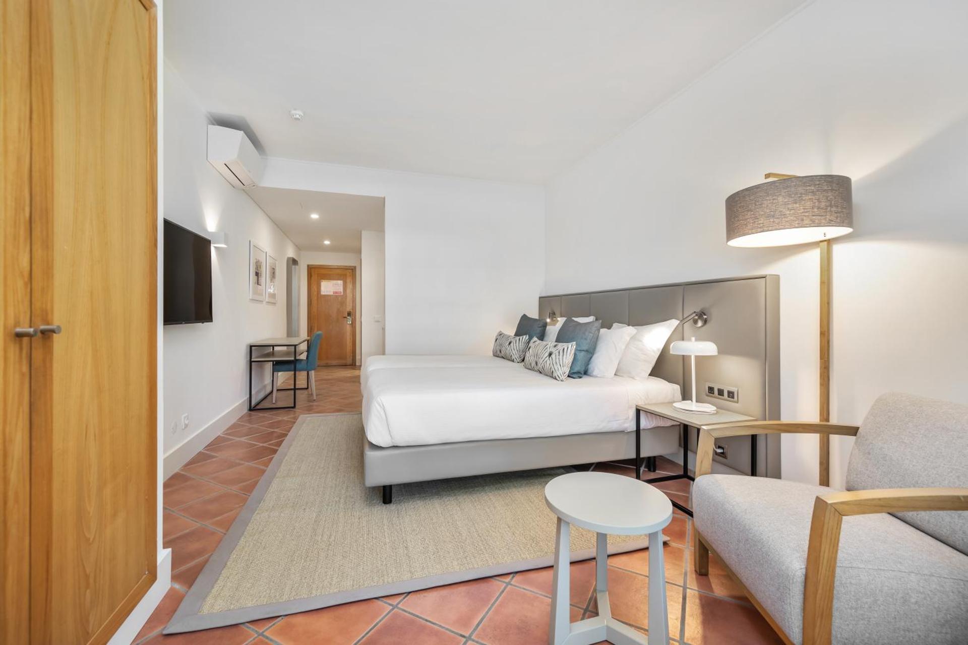 The Patio Suite Hotel - Photo 25