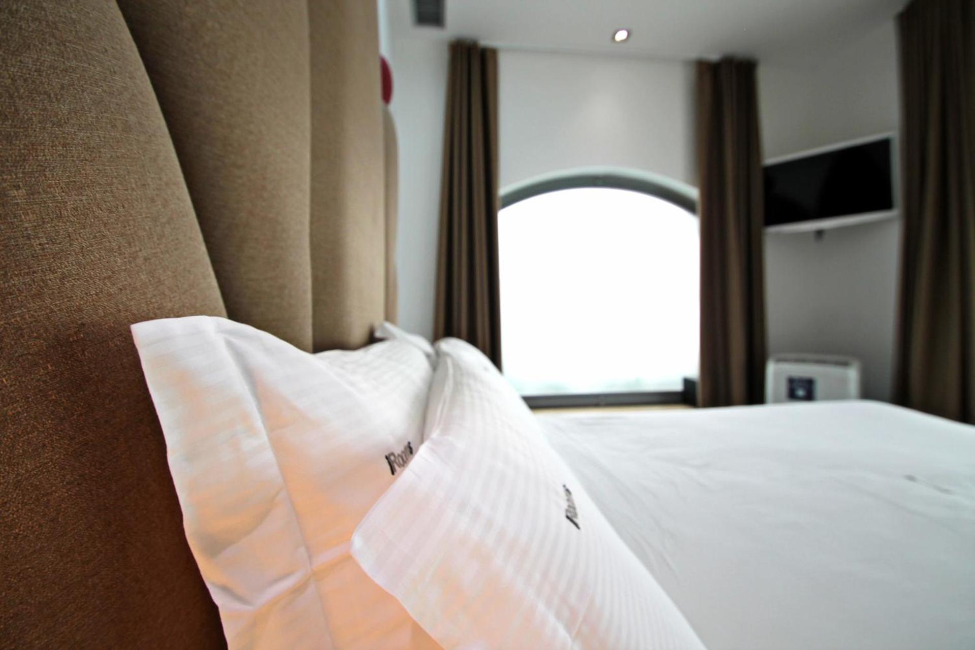 Wrooms Guest House - Photo 13