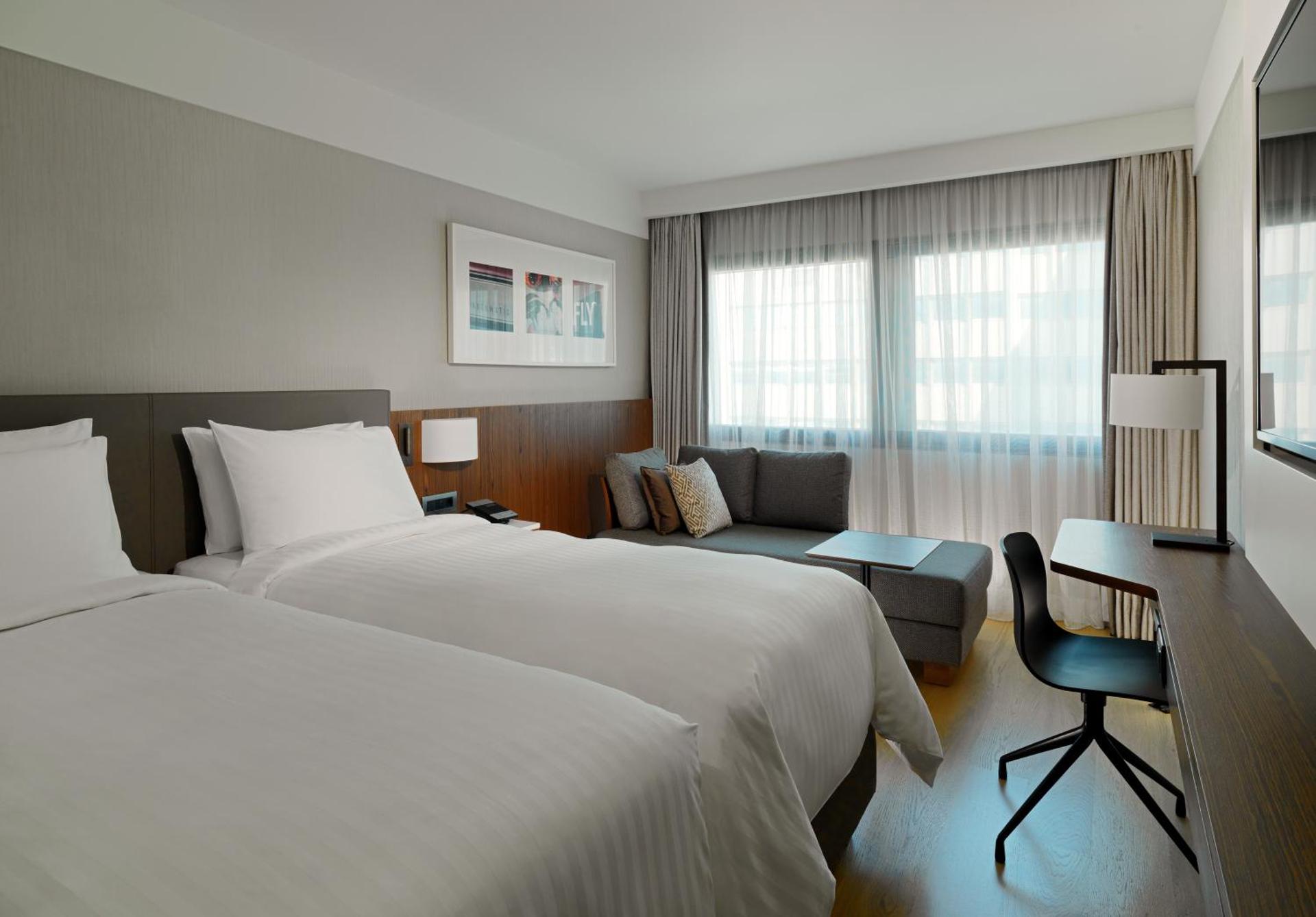 Premium Guest Room with Two Single Beds and City View