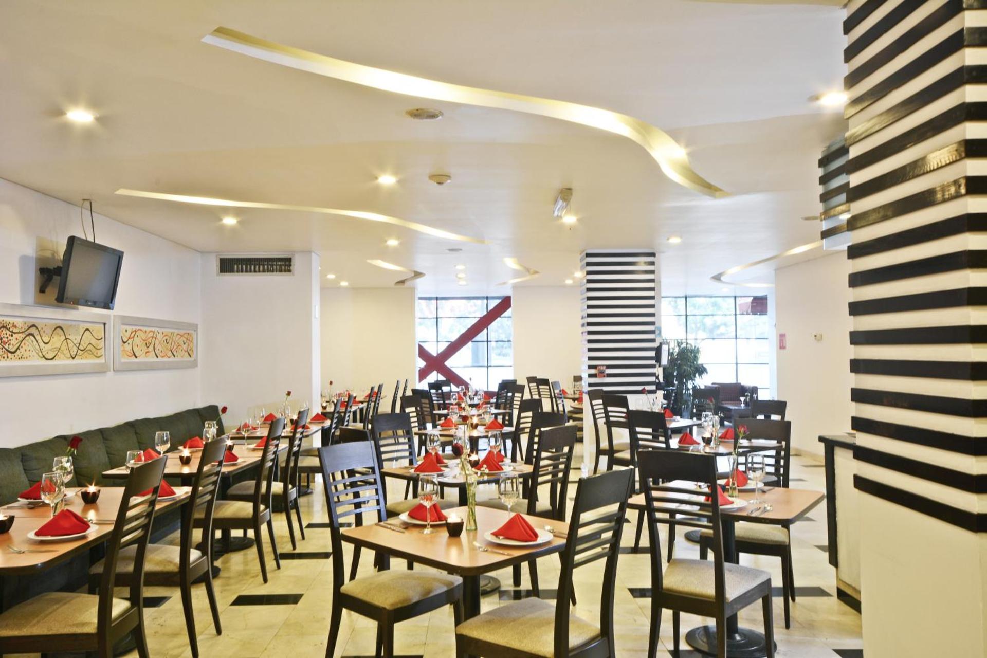 Hotel & Suites PF - Photo 26