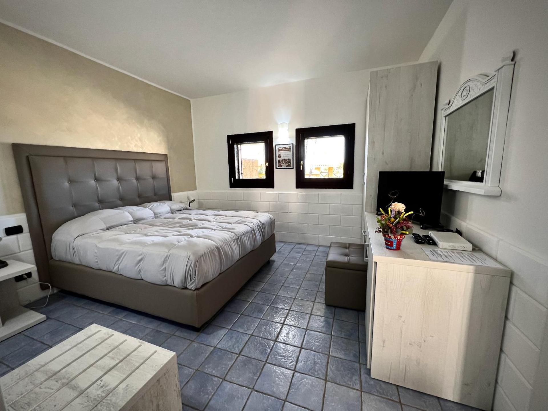 Hotel Capo Campolato - Photo 11