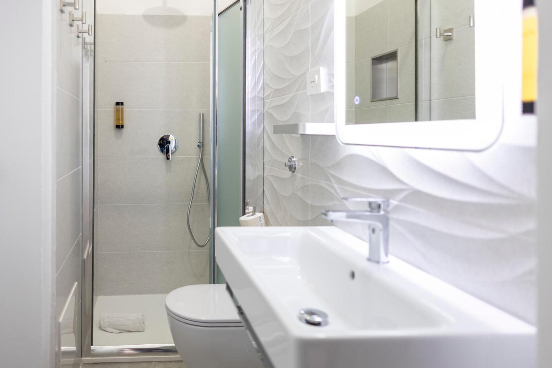 Dolce Vita Rooms and Apartments - Photo 17