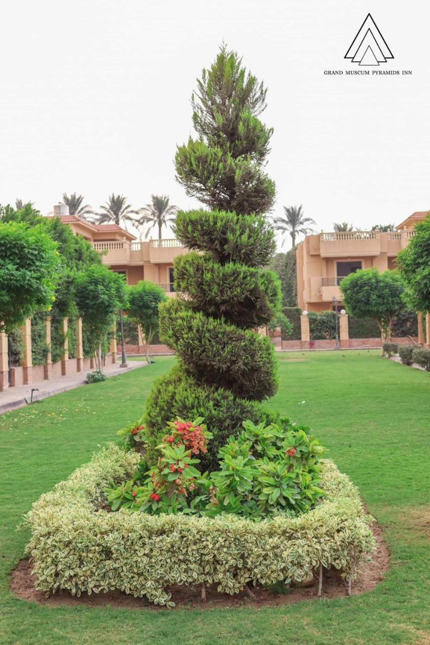 Luca Pyramids Inn - Photo 18