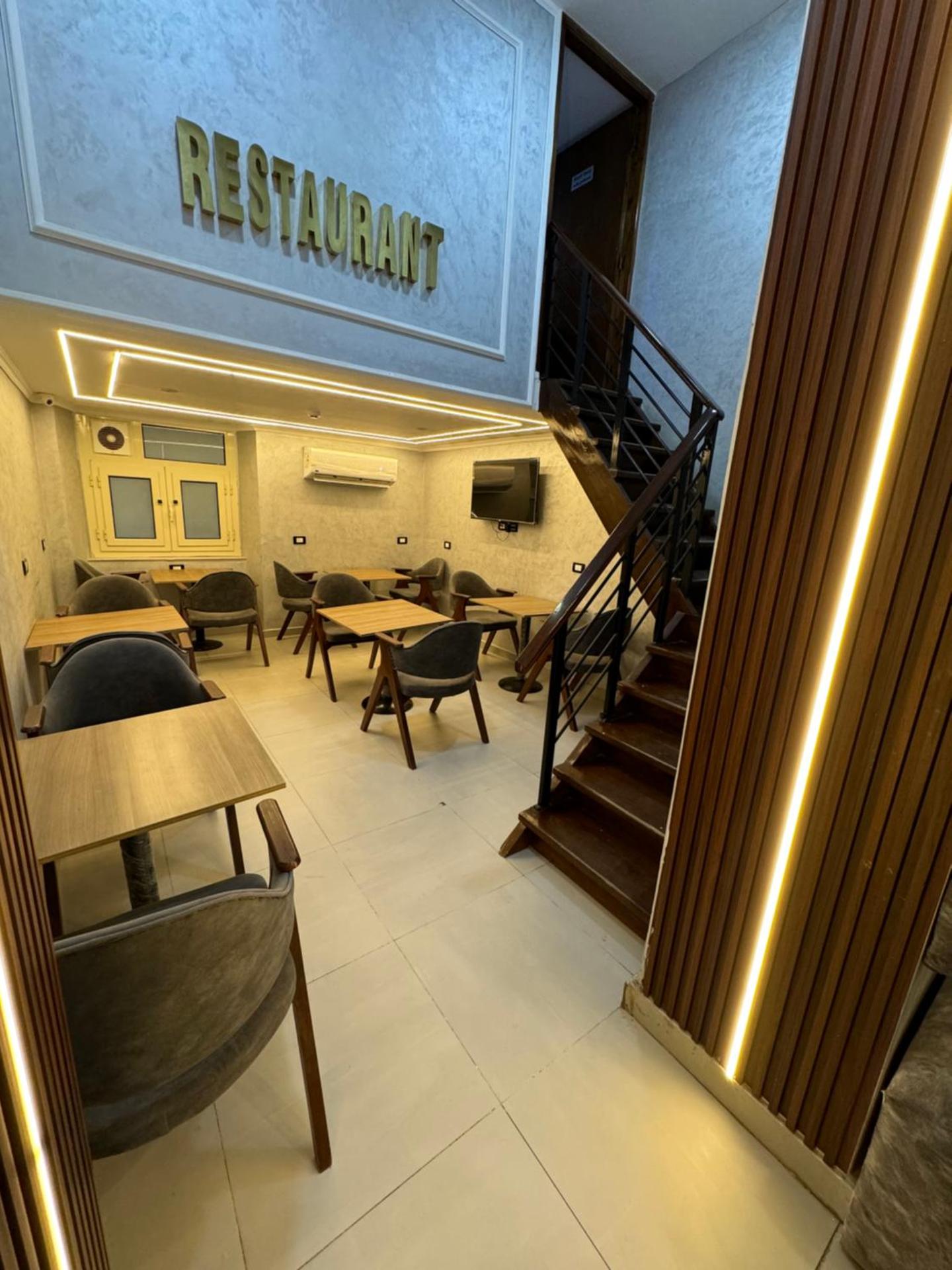 Tourist Plaza Hotel - Photo 15