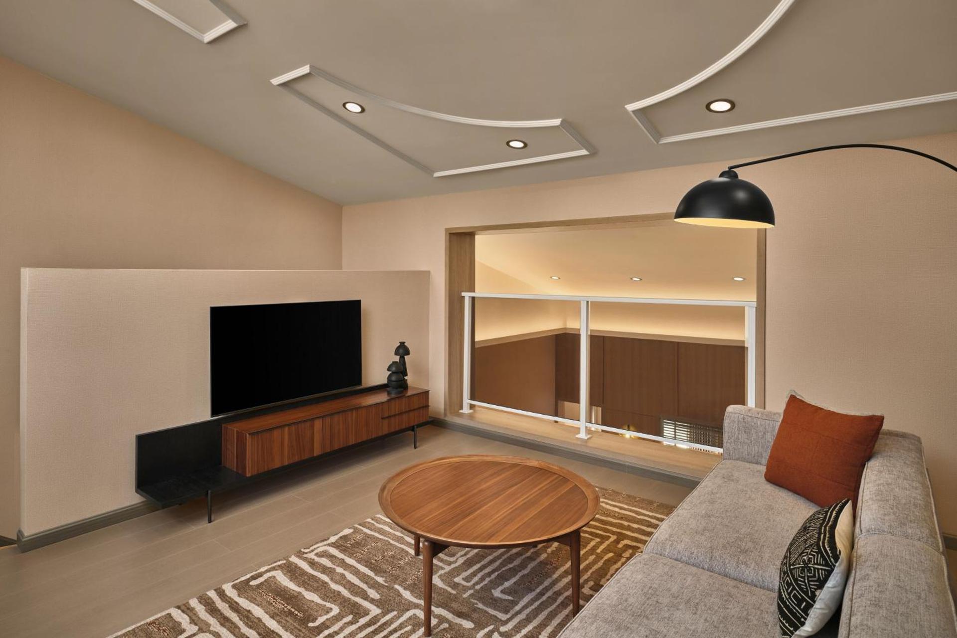 One King Bedroom Split-Level Suite - Photo 3