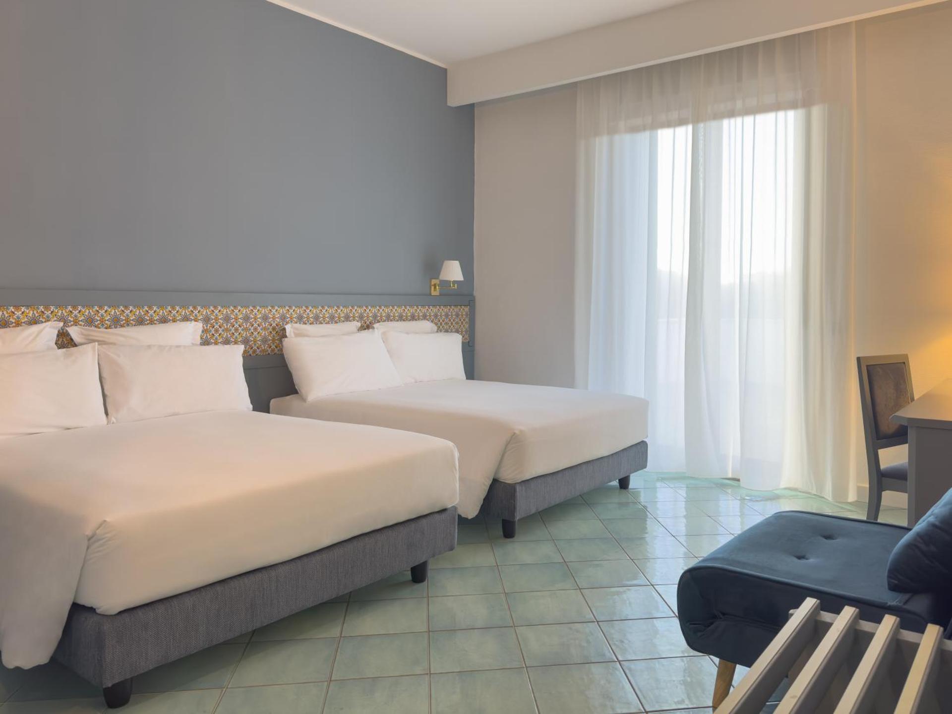 Quadruple Room with Terrace and Sea View- Annex