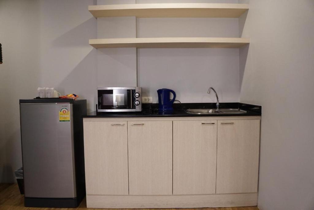 The One Residence Hotel - Photo 13