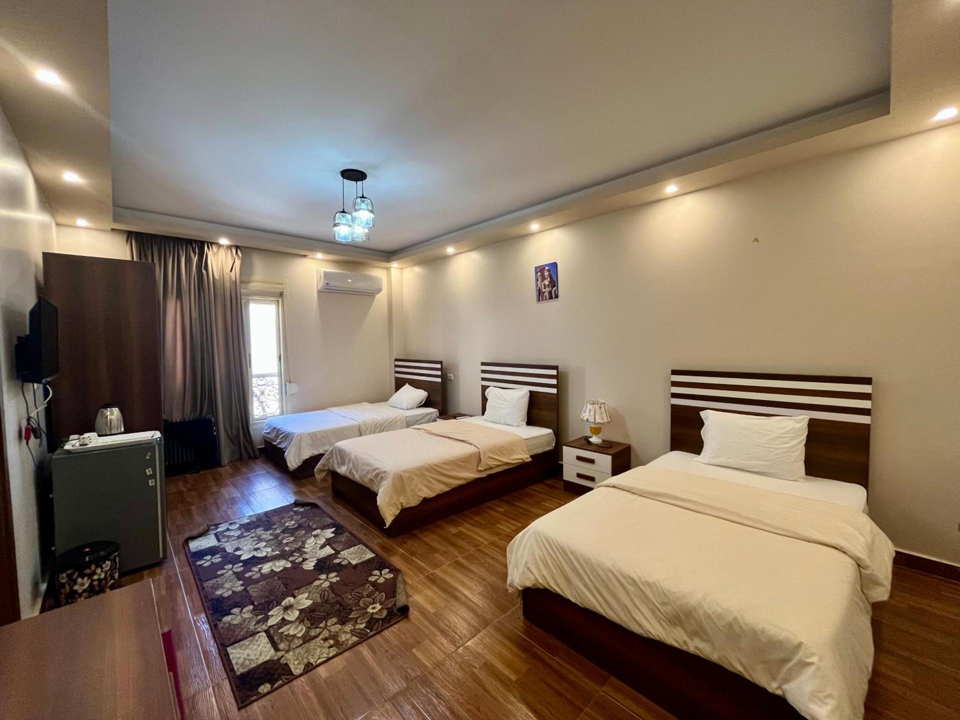 Luca Pyramids Inn - Photo 36