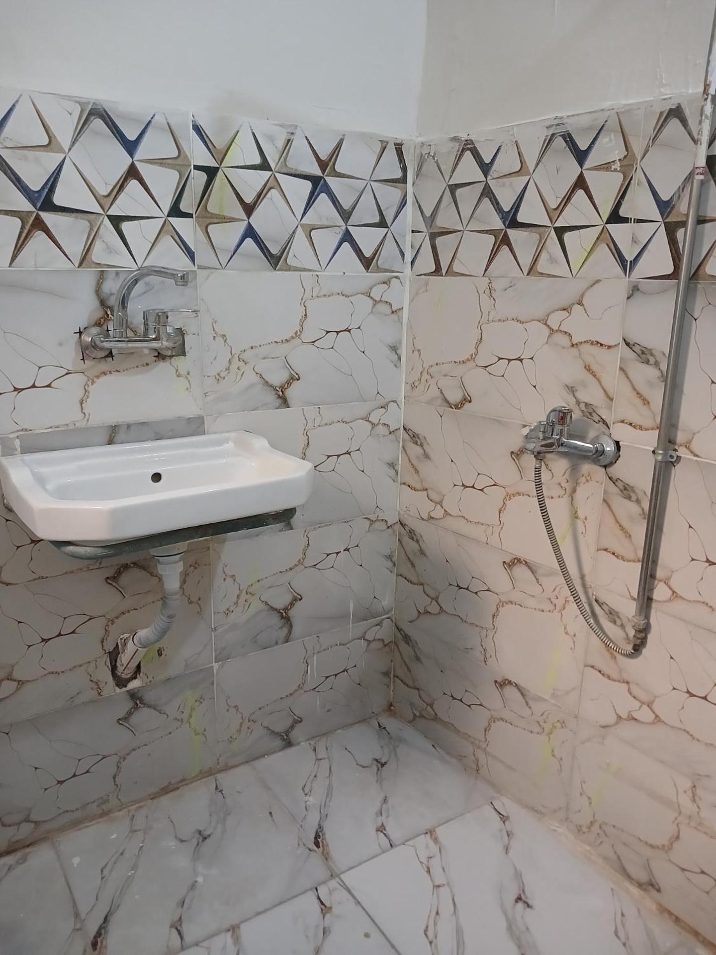 Economy Triple Room with Shared Bathroom