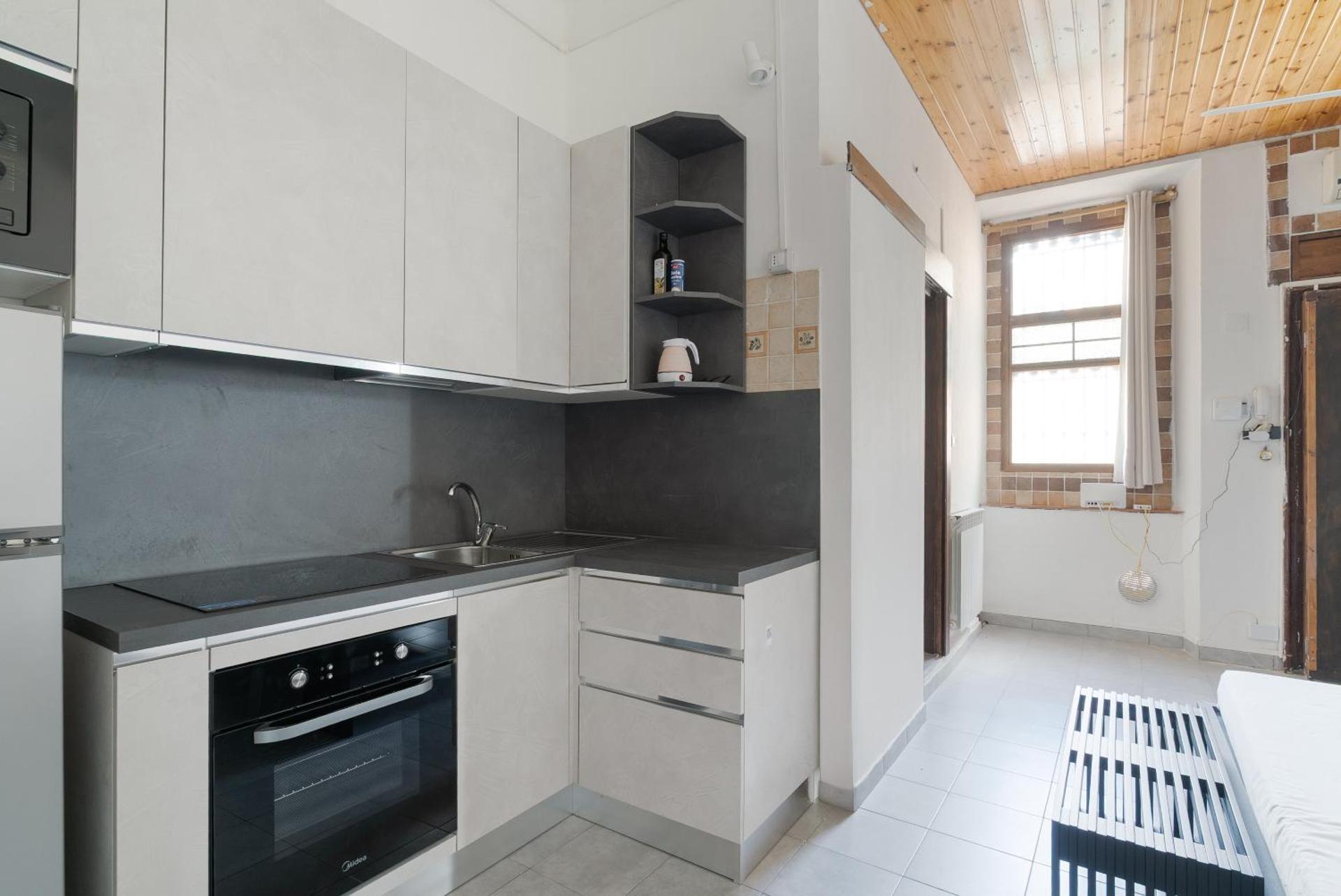 GuestHost - Comfy Studio Apartment San Cristoforo - Photo 16