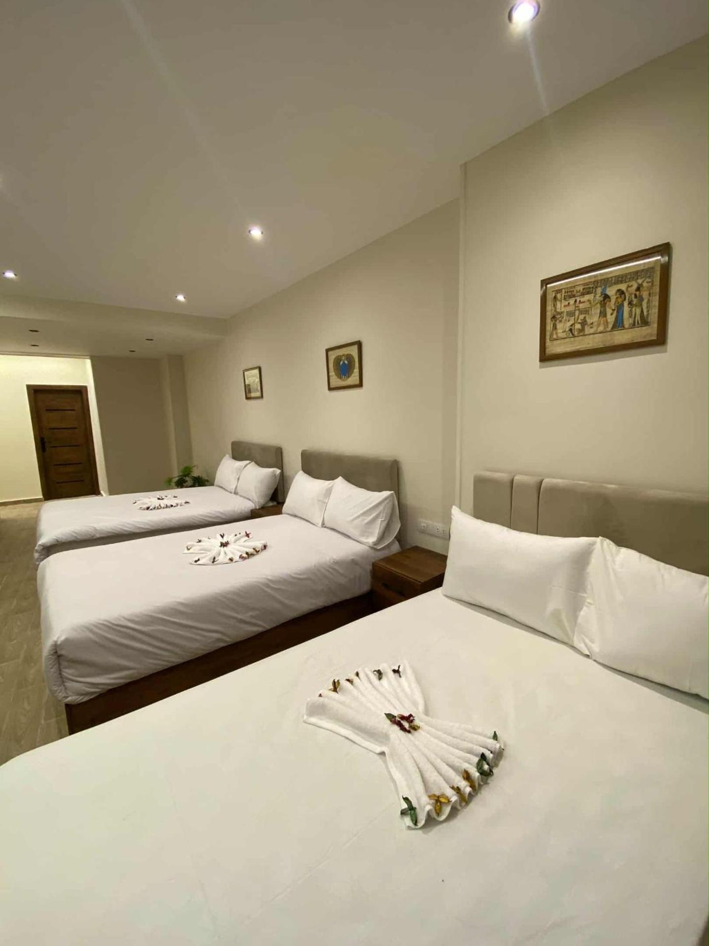 New Galleria Pyramids view inn - Photo 16