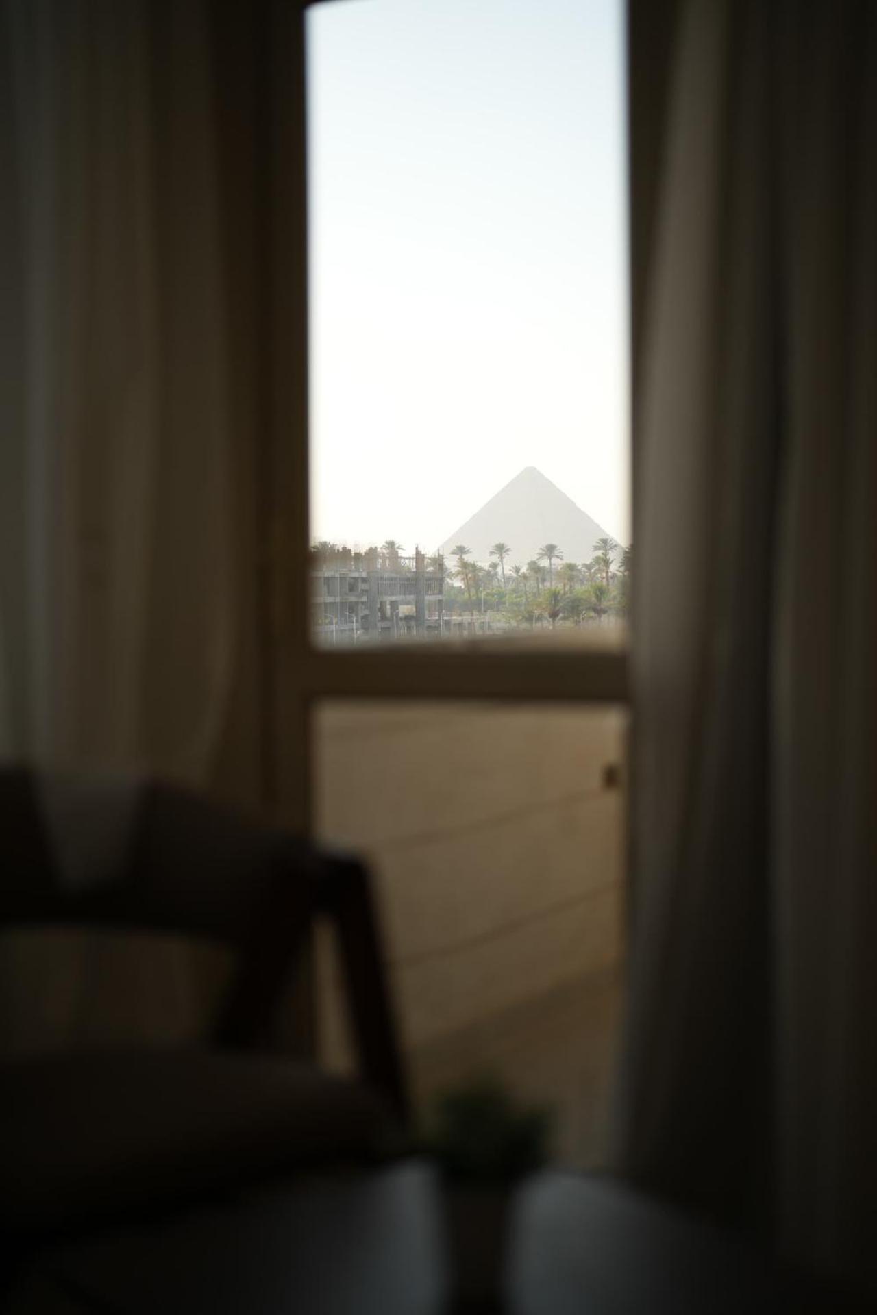 New Galleria Pyramids view inn - Photo 62