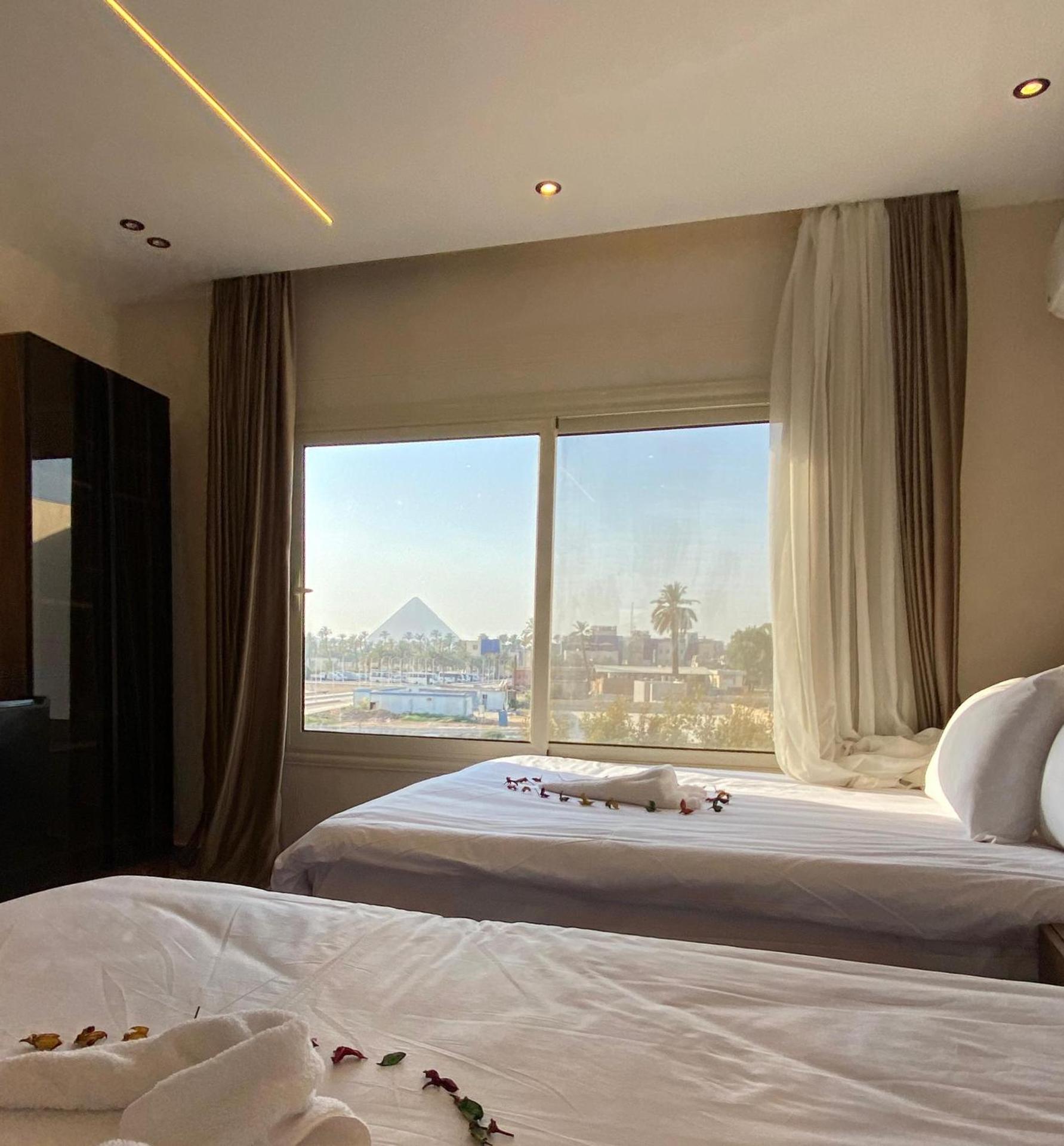 New Galleria Pyramids view inn - Photo 19